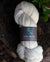 Undyed skein of merino, cashmere, nylon yarn