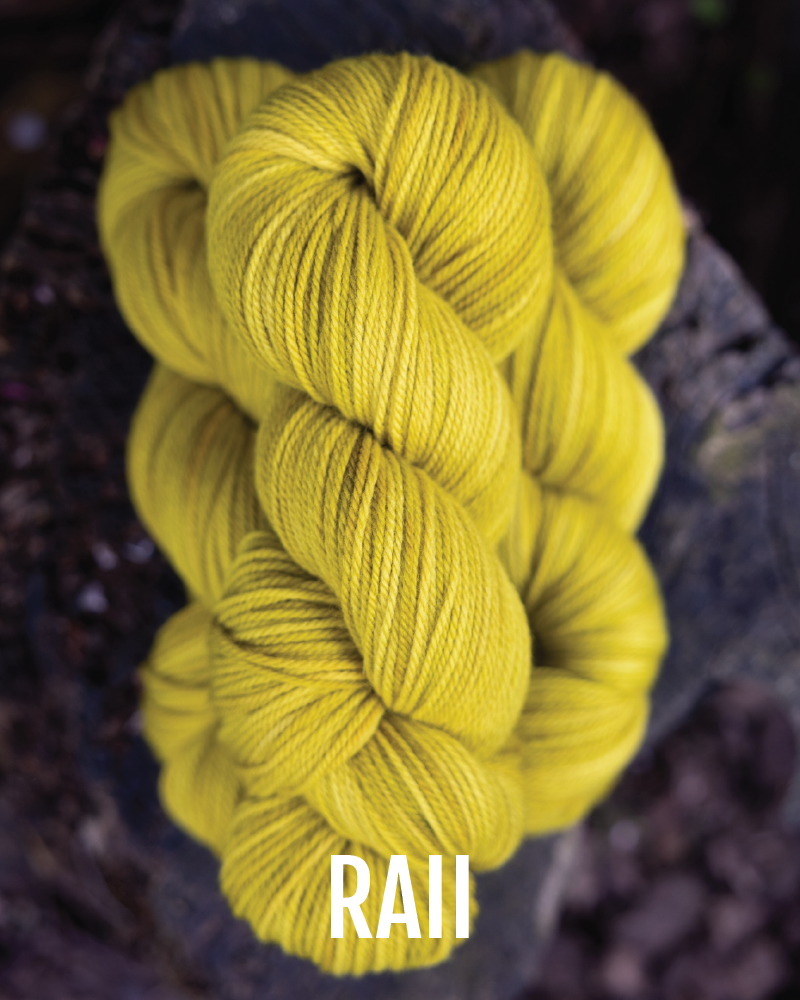 A stack of hand-dyed worsted weight  yarn in an electric green